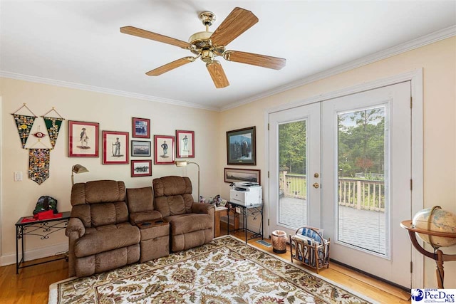 4105 Byrnes Blvd, Florence, SC 29506 - living area featuring french doors, light wood-type flooring, ornamental molding, and a ceiling fan