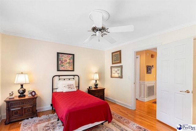 4105 Byrnes Blvd, Florence, SC 29506 - bedroom featuring light wood finished floors, ornamental molding, and a ceiling fan