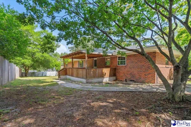 back of property featuring a porch