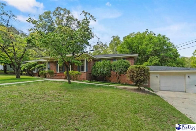 ranch-style house with a garage and a front lawn