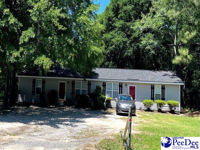 1210 Whites Cir, Darlington, SC 29532 - single story home featuring dirt driveway and a front yard