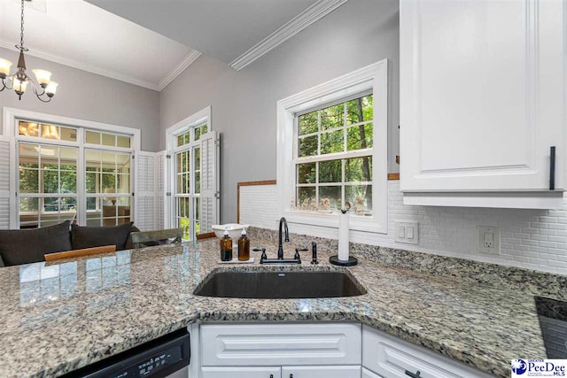 2409 Sarazen Ct, Florence, SC 29506 - kitchen with a sink, dishwasher, white cabinetry, light stone countertops, and a chandelier