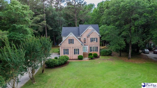 2409 Sarazen Ct, Florence, SC 29506 - view of front facade with a front yard