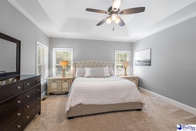 2409 Sarazen Ct, Florence, SC 29506 - bedroom with a raised ceiling, light carpet, baseboards, ornamental molding, and ceiling fan