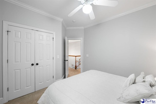 2409 Sarazen Ct, Florence, SC 29506 - bedroom with ornamental molding, a closet, ceiling fan, and light colored carpet
