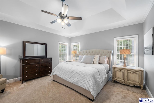 2409 Sarazen Ct, Florence, SC 29506 - bedroom with light carpet, a tray ceiling, baseboards, crown molding, and ceiling fan