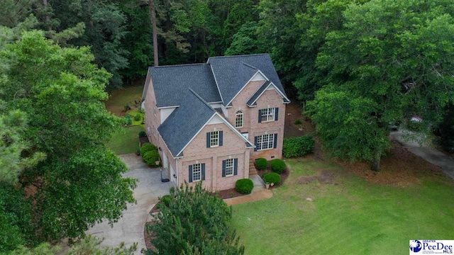 2409 Sarazen Ct, Florence, SC 29506 - view from above of property featuring a heavily wooded area
