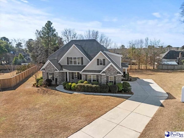 view of front of home with a front lawn