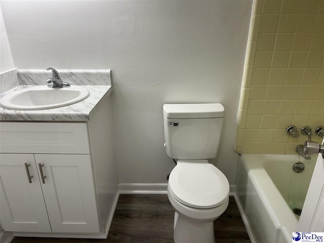 310 Pinewood St, Bennettsville, SC 29512 - full bathroom featuring vanity and wood finished floors