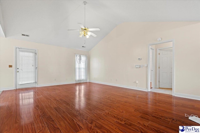 unfurnished living room featuring visible vents, a ceiling fan, wood finished floors, high vaulted ceiling, and baseboards