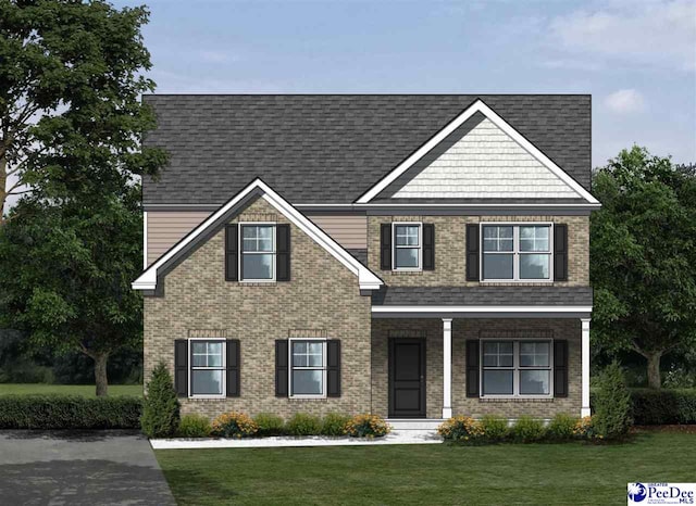 5010 E Old Marion Hwy, Florence, SC 29506 - craftsman-style house with a front yard, brick siding, a shingled roof, and a porch
