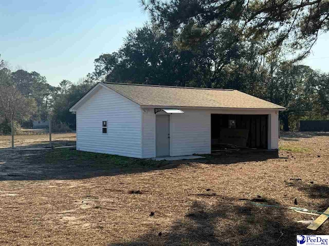 view of outdoor structure featuring a garage