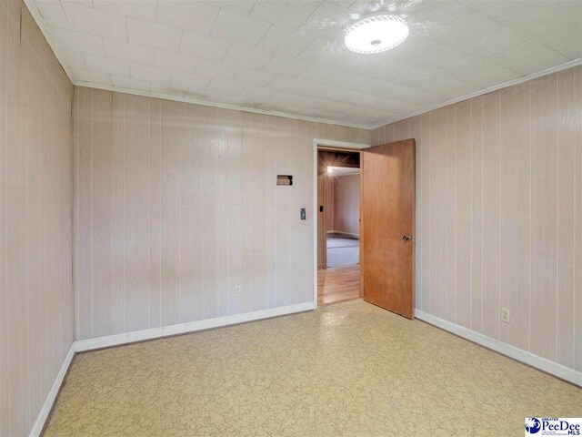 1709 N Irby St, Florence, SC 29501 - spare room featuring baseboards