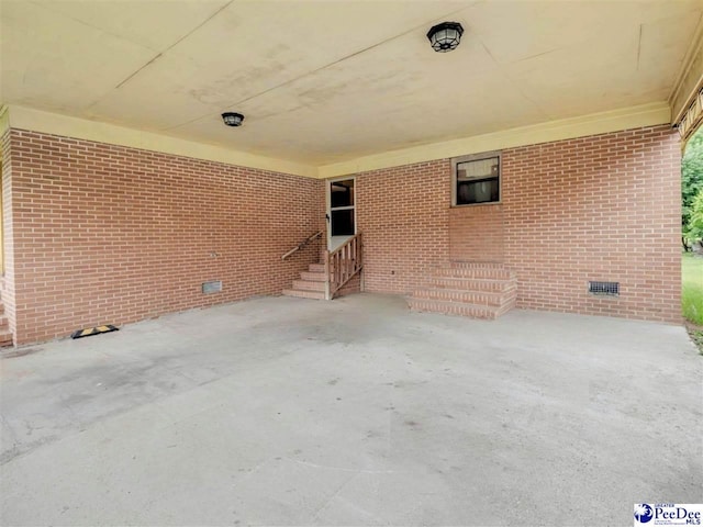 1709 N Irby St, Florence, SC 29501 - view of patio featuring entry steps and an attached carport