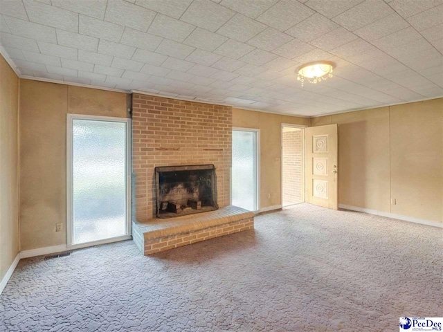 1709 N Irby St, Florence, SC 29501 - unfurnished living room featuring carpet floors and healthy amount of natural light