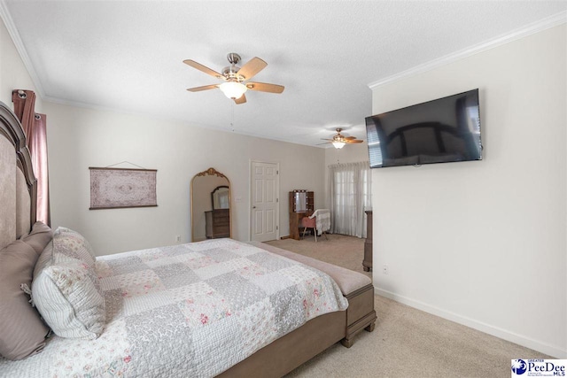 carpeted bedroom with a ceiling fan, crown molding, baseboards, and a textured ceiling