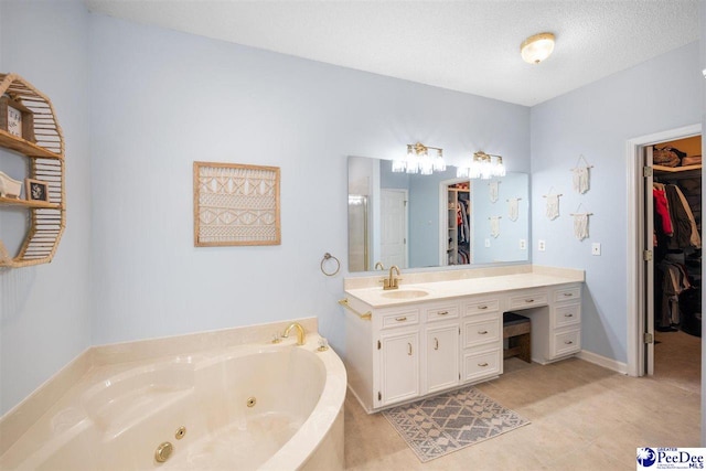 bathroom with a spacious closet, vanity, a whirlpool tub, and a shower stall