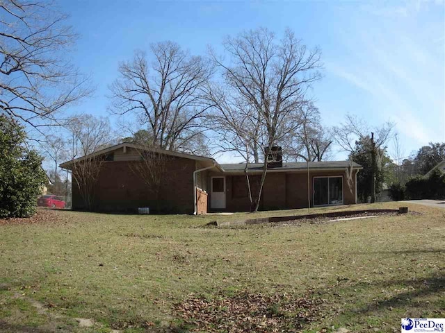 view of front of home with a front yard