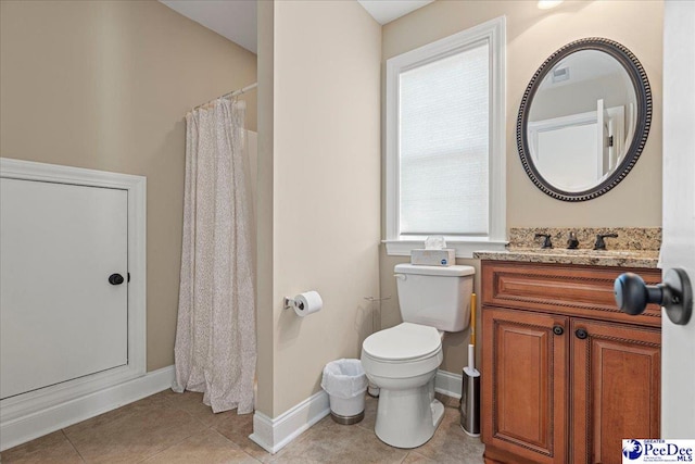 bathroom featuring a shower with curtain, tile patterned floors, toilet, and vanity