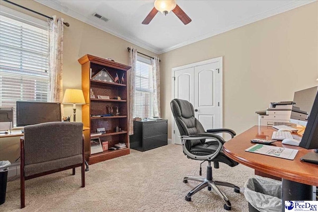 office area with light carpet, crown molding, and ceiling fan