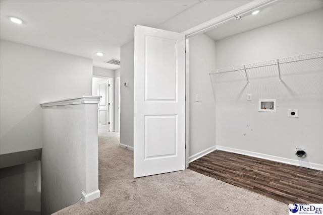 laundry area with carpet floors, hookup for a washing machine, and electric dryer hookup