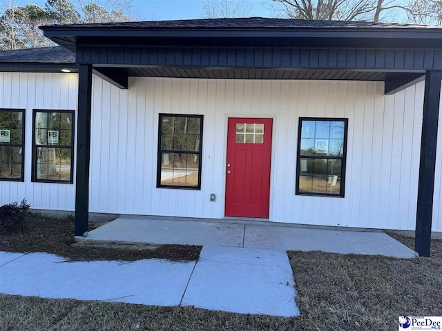 doorway to property featuring a patio