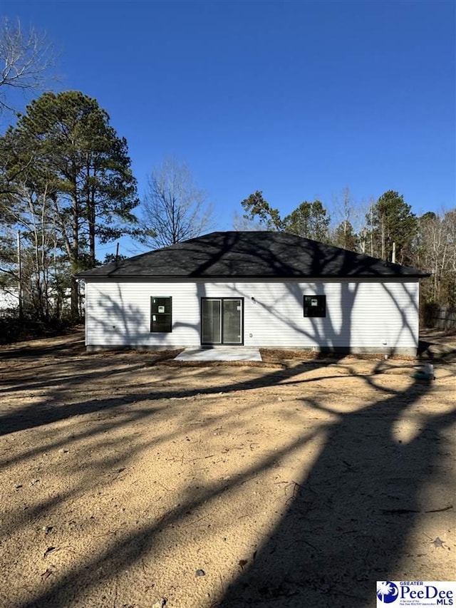 back of property featuring a patio