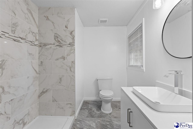 616 Sandra Ter, Florence, SC 29501 - full bathroom with visible vents, marble finish floor, a tile shower, toilet, and vanity