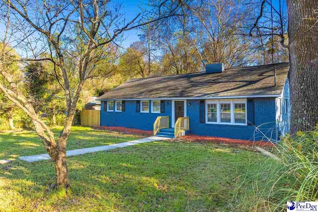 616 Sandra Ter, Florence, SC 29501 - ranch-style house featuring a front yard, fence, and brick siding