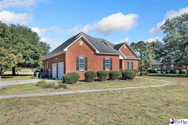 exterior space with a garage and a front yard