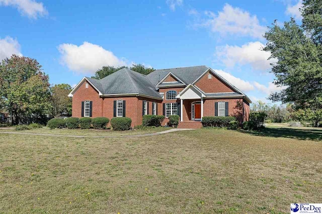 view of front of property with a front lawn