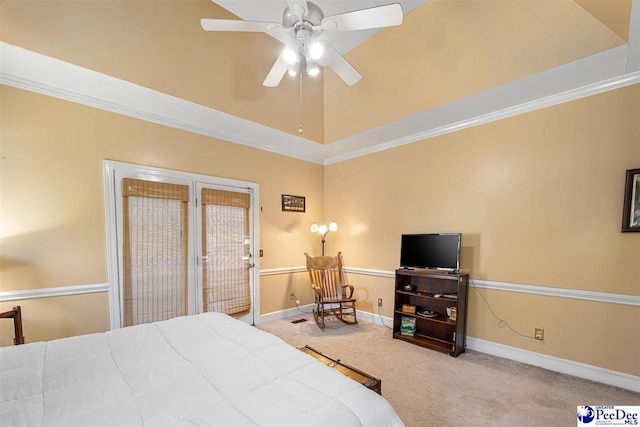 bedroom featuring ornamental molding, light colored carpet, and vaulted ceiling