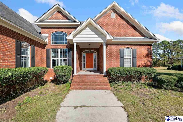 view of front facade with a front yard