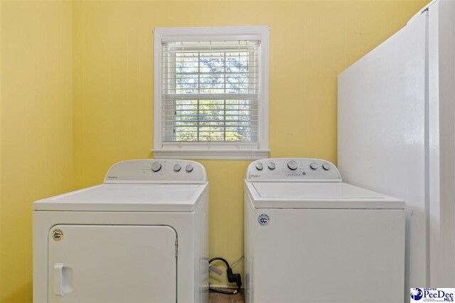 616 Forest Acres Dr, Pamplico, SC 29505 - clothes washing area with washer and dryer and laundry area
