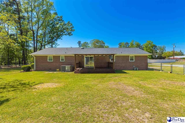 616 Forest Acres Dr, Pamplico, SC 29505 - rear view of property featuring brick siding, central AC unit, and a lawn