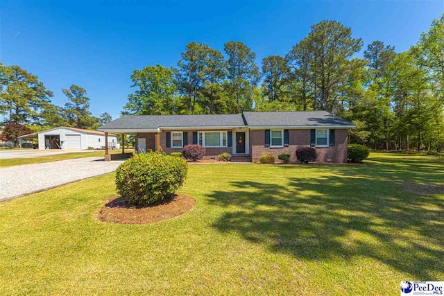 616 Forest Acres Dr, Pamplico, SC 29505 - single story home with a carport, a garage, an outdoor structure, concrete driveway, and a front lawn