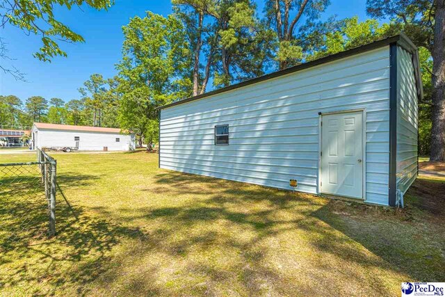 616 Forest Acres Dr, Pamplico, SC 29505 - view of outdoor structure with an outbuilding and fence