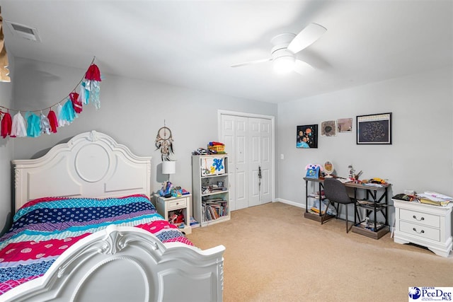 3312 Poplar Chase Ln, Florence, SC 29501 - bedroom with carpet floors, a closet, and a ceiling fan