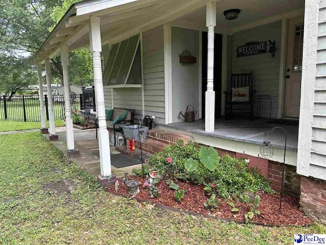 223 Third St, Cheraw, SC 29520 - exterior space with a porch and fence