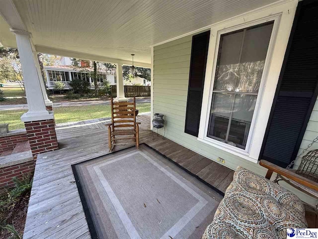 223 Third St, Cheraw, SC 29520 - wooden terrace featuring a porch