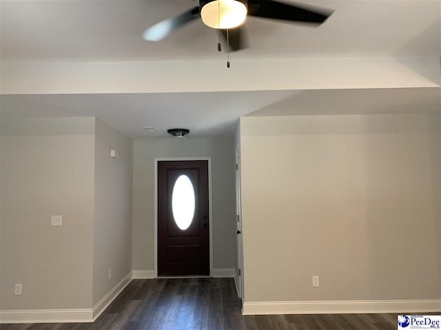 7423 E National Cemetery Rd, Florence, SC 29506 - foyer featuring dark wood-style floors, ceiling fan, and baseboards
