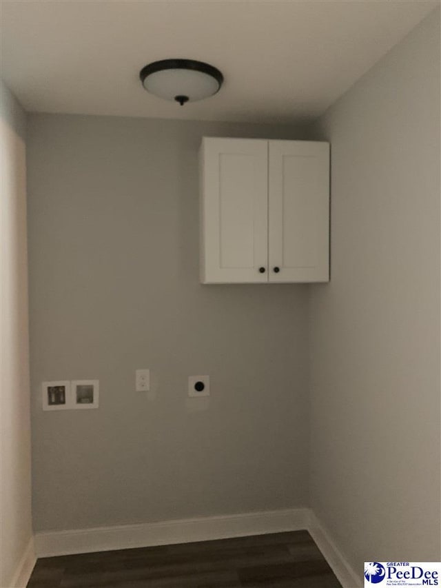 washroom featuring cabinet space, baseboards, washer hookup, and electric dryer hookup