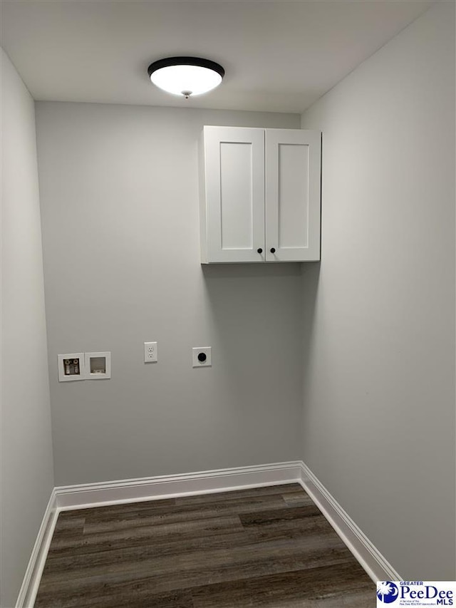 7423 E National Cemetery Rd, Florence, SC 29506 - washroom featuring electric dryer hookup, cabinet space, washer hookup, dark wood-style floors, and baseboards