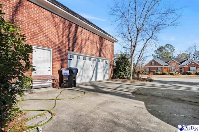 3202 W Hampton Pointe Dr, Florence, SC 29501 - view of property exterior featuring brick siding and driveway