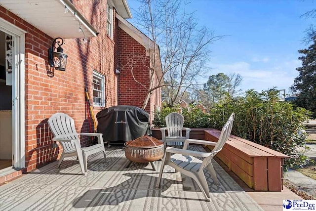 3202 W Hampton Pointe Dr, Florence, SC 29501 - deck featuring an outdoor fire pit and a grill
