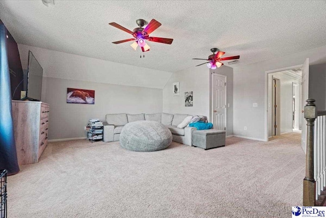 3202 W Hampton Pointe Dr, Florence, SC 29501 - living area featuring ceiling fan, carpet, a textured ceiling, baseboards, and lofted ceiling