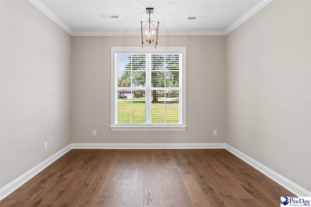 2104 Lacy St, Florence, SC 29505 - unfurnished room featuring healthy amount of natural light, dark wood-style flooring, ornamental molding, and a chandelier