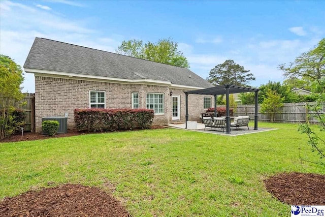 rear view of property with central AC, a pergola, a patio, brick siding, and fence private yard