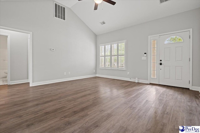 foyer featuring visible vents, high vaulted ceiling, a ceiling fan, and dark wood-style floors