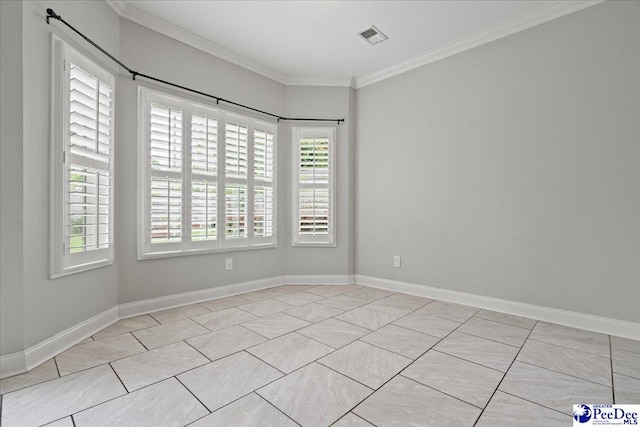 unfurnished room featuring crown molding, visible vents, plenty of natural light, and light tile patterned floors